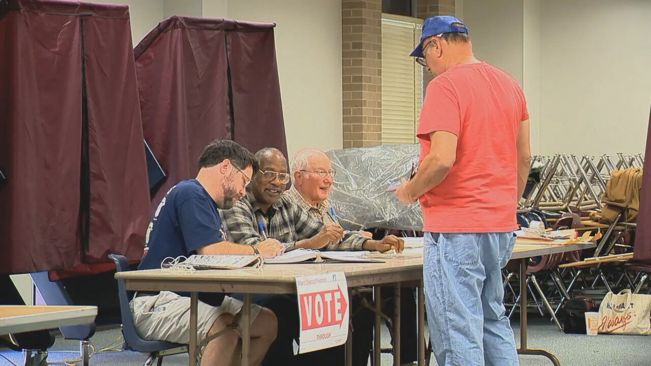 closed primary - voter at table